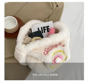 Interior capacity of the white plush donut tote bag showing phone and cosmetics