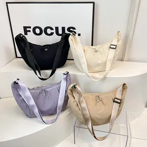 Minimalist nylon crescent crossbody bags in black beige purple and khaki colors