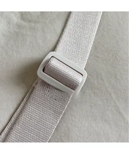 Macro detail of high-density nylon strap with adjustable plastic buckle for handbags