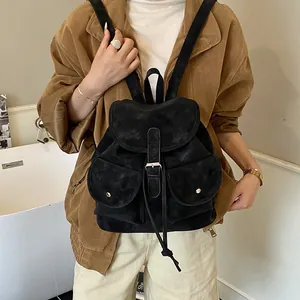 Sac à dos vintage noir minimaliste en faux daim avec cordon et boucles métal