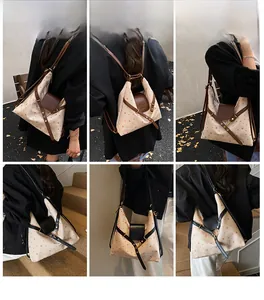 Polka dot canvas bag detail showing adjustable straps and versatile shoulder carrying styles