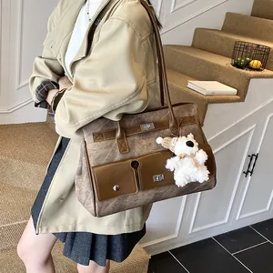 Retro patchwork faux leather tote bag with dual front pockets and plush bear charm