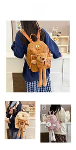 Detail view of mini backpacks with 3D plush dolls and vintage letter patterns