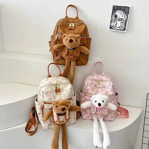 Chic bear print mini backpacks in brown, white and pink with plush doll charms