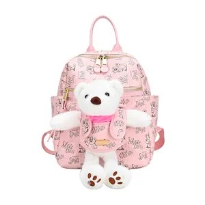 Pink PU leather backpack with cute bear doll and stylish cartoon pattern prints