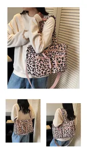 Detail view of pink leopard print corduroy tote bag showing large capacity and zippers
