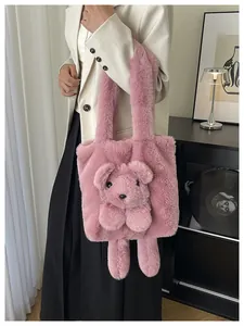 Detailed close-up of a pink plush tote bag with a 3D bear doll accent on the fuzzy surface