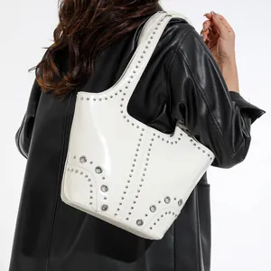 White rivet underarm shoulder bag in patent leather with punk corset design for women