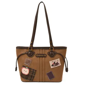 Sac fourre-tout marron avec écussons de dessin animé et coutures contrastées, style chic