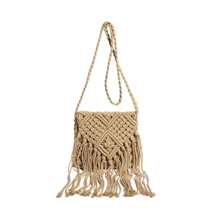 Bohemian hand-woven crossbody bag with natural cotton tassel fringe and hollow knit texture