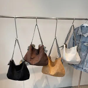 Large capacity suede shoulder bags in four colors with zebra pattern bow straps