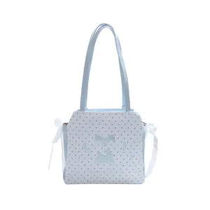Sac fourre-tout bleu clair à pois avec broderie lapin et rubans de dentelle blanche