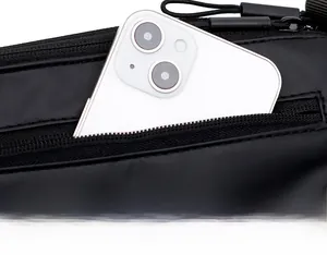 Macro detail of the back zipper pocket on the nylon bag holding a large smartphone