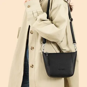 Classic black lychee pattern leather bucket bag with silver hardware for women