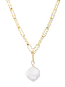 Detailed macro of gold paperclip chain necklace featuring a flat freshwater pearl pendant