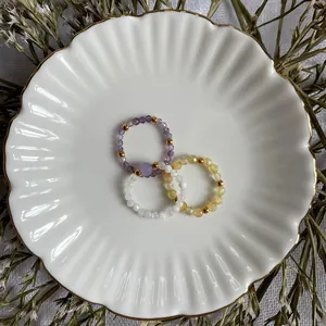 Minimalist handmade colorful natural stone beaded rings set with gold accents