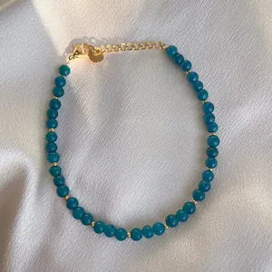 Deep teal natural stone beaded bracelet with 18k gold plated titanium clasp and chain