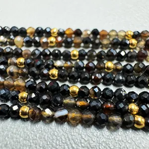 Handmade faceted natural stone necklace with gold beads in minimalist vintage style