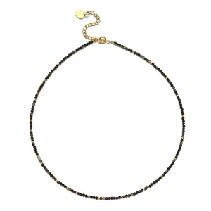 Vintage faceted natural stone beaded necklace with gold accents and heart charm