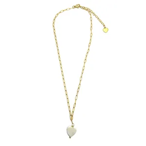 Detail of paperclip chain and white mother of pearl heart pendant in 18k gold plating