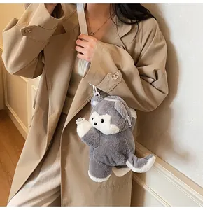 Detail of cute husky plush crossbody bag with gray and white soft fur and white zipper