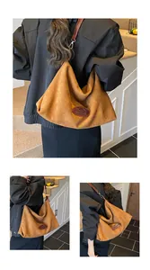 Detail shots of a large brown suede hobo tote bag featuring minimalist logo and leather strap