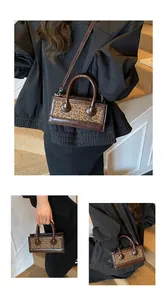 Three-view detail of a leopard print mini square bag with glossy brown leather trim