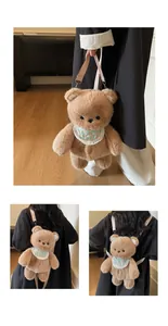 Detail of plush brown teddy bear backpack with lace bib and adjustable beige strap