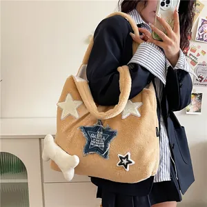 Large khaki faux fur tote bag with star embroidery and white bone pendant accessory