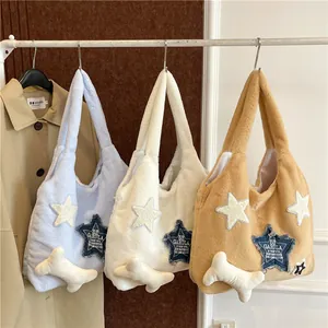 Fuzzy plush tote bag with star embroidery and cute bone charm in soft colors