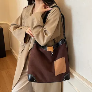 Retro oversized suede tote bag in dark brown and khaki with black leather trim and silver hook