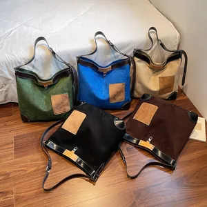 Large suede tote bag with leather trim available in five vintage colors for daily use