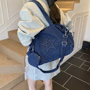 Fashionable dark blue denim tote bag with 3D star embossing and adjustable straps