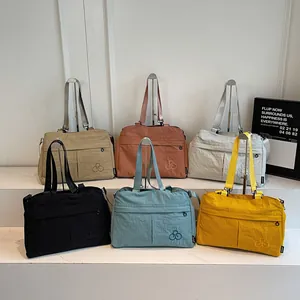 Lightweight nylon tote bags for women in six colors with adjustable straps for travel