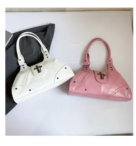 Detail of white and pink retro oil-waxed leather tote bags with cross metal buckles