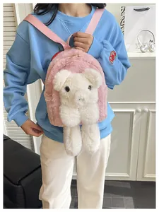 Detail view of cute plush bear shoulder bag showing soft pink faux fur and teddy design