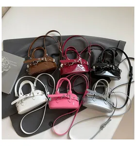 Detailed collection of mini shell bags in six colors with glossy patent leather finish