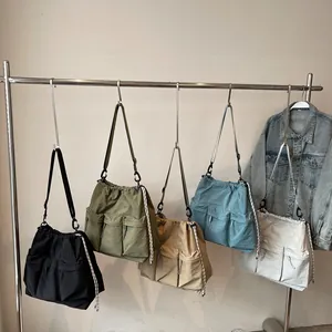 Waterproof nylon multi-pocket drawstring tote bags in black olive khaki and blue