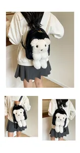 Detail showing the plush bear design, soft faux mink fur texture, and gold metal zippers
