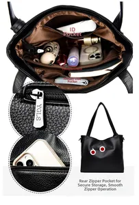 Detail view of large black tote bag interior pockets and functional metal zippers