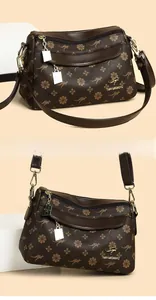 Détails du sac bandoulière marron en cuir avec motifs floraux et finitions dorées chic