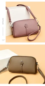 Détails de sacs coquillage en similicuir avec zip fleur en métal et fines bretelles spaghetti