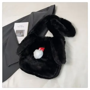 Detail of creative plush rabbit ear tote bag featuring soft faux fur and white pom-pom accent