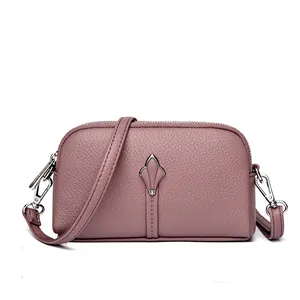 Sac à bandoulière chic rose pour femme avec texture litchi, boucle tulipe et double zip