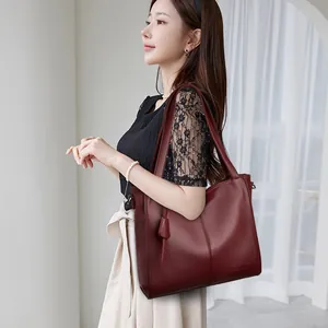 Large burgundy lychee pattern faux leather tote bag for women with minimalist vertical seam