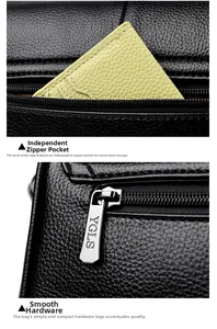 Dettaglio borsa in pelle granulata nera con tasca posteriore e cerniera in metallo argento