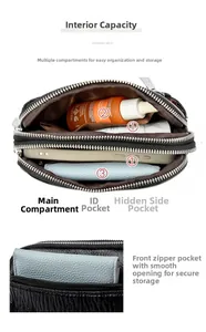Top view of black pebbled leather crossbody bag showing multiple inner compartments
