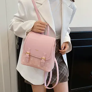 Pink mini faux leather backpack with bear print and top handle for casual travel