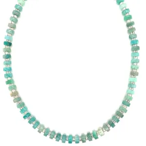 Detailed view of bohemian turquoise stone beads necklace with silver spacers