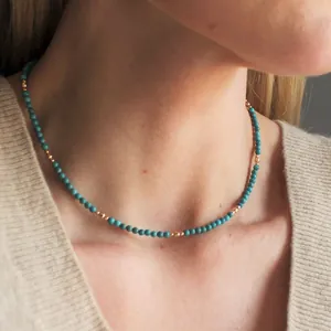 French vintage style necklace with turquoise beads and gold metal accents for women